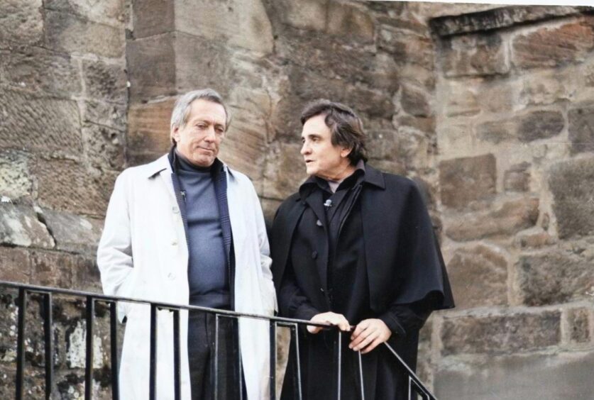 Johnny Cash and Andy Williams outside 