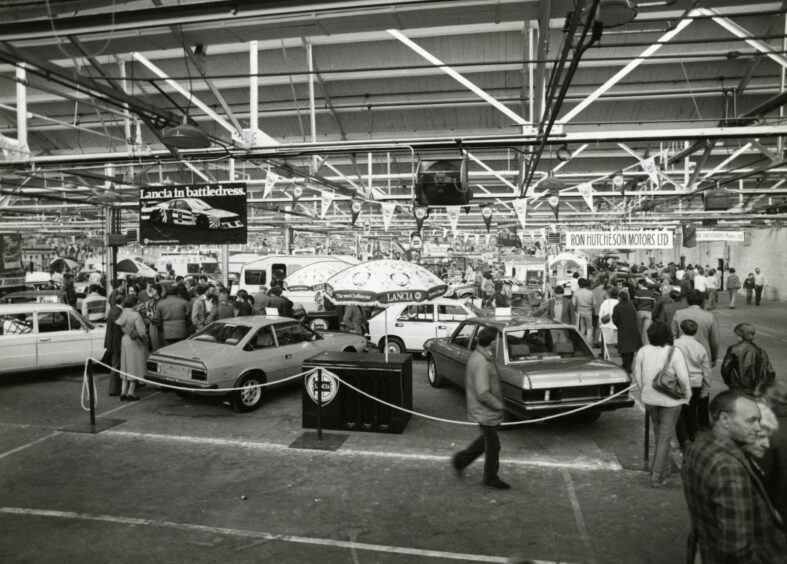 cars and visitors at the Dundee Motor Show in 1983. 