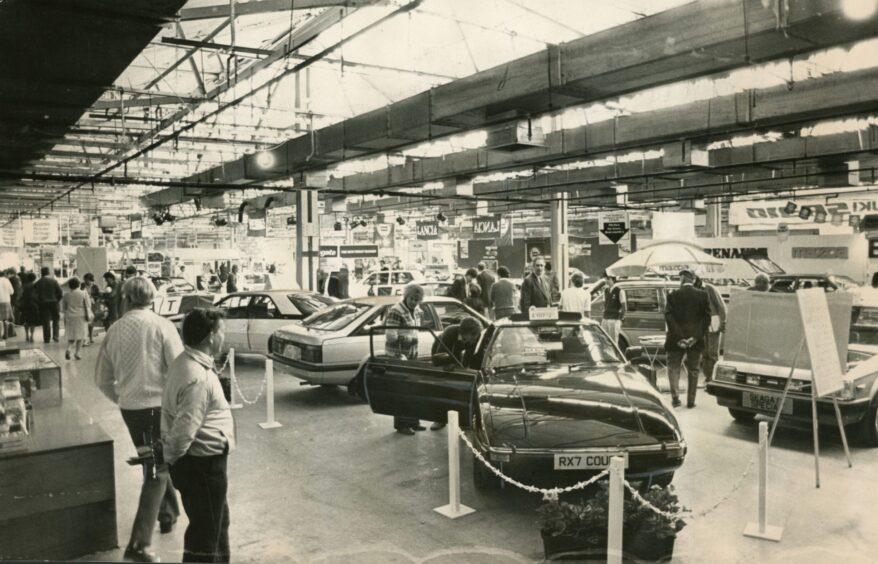 people and cars inside the Dunsinane Avenue venue in 1984.