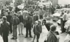 Crowds gathering round the vehicles indoors at the 1985 Dundee Motor Show.