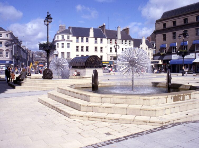 Another view of the City Square in June 1988, looking past two fountains to Samuel's Corner. 