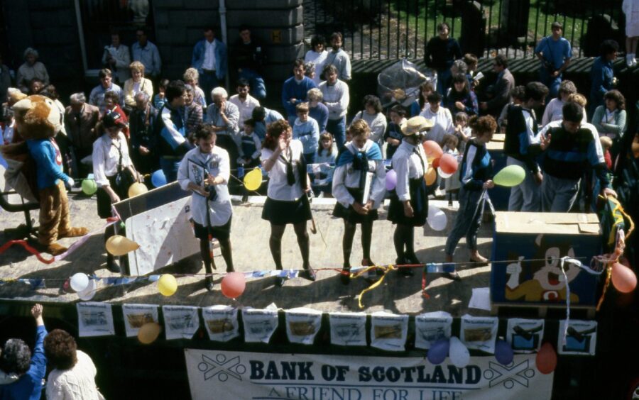 Bank of Scotland workers party at the festival on a decorated float.