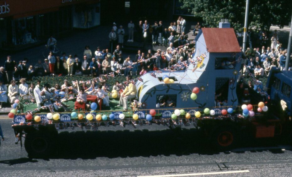 a float passes a street in dundee