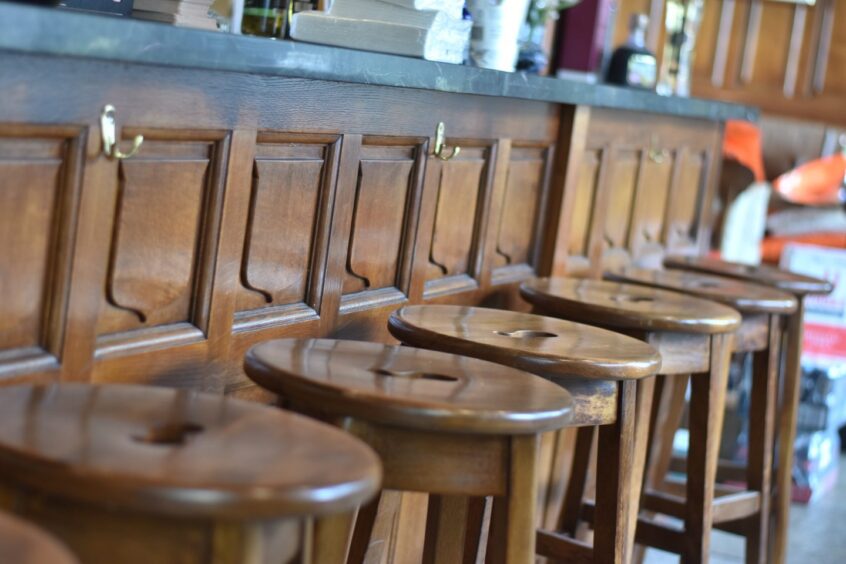 A row of bar stools.