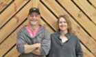 Kevin Kelly and Julia McCarthy smiling.