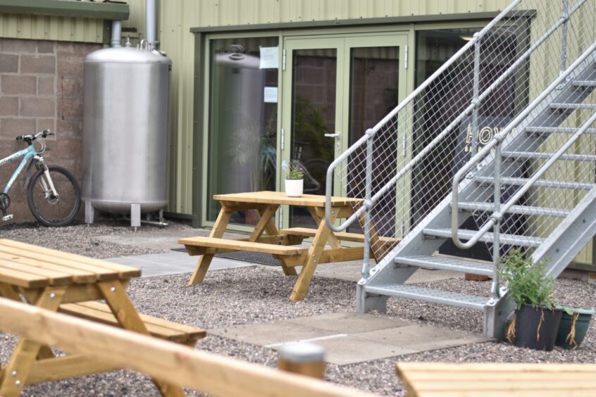 Picnic benches outside Howe Beer Project.