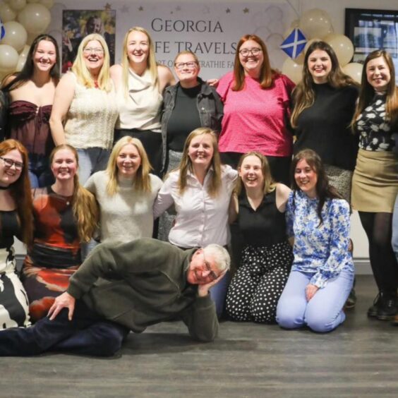 David Potter with some of the Strathmore women's rugby team.