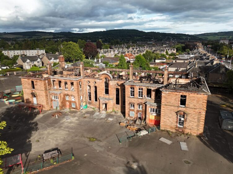 View from a drone of a fire-ravaged building. 