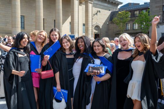 Graduates celebrate after Dundee University's graduation ceremony, Caird Hall, Dundee. Image: Richard Hancox/DC Thomson
