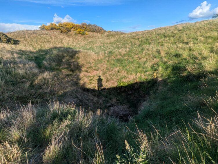 The cistern, or well, at Finavon hillfort