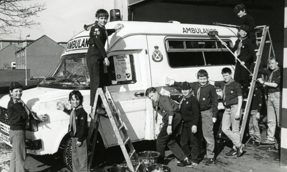 1st Cupar Scouts washing an ambulance in February 1989. Image: DC Thomson.