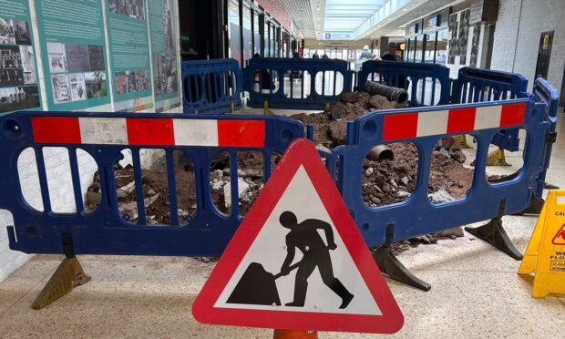 A section of the shopping centre was cordon off with barriers.