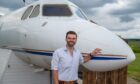 Iain Gall with the converted aircraft. Image: Richard Hancox/DC Thomson