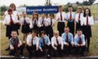 Braeview Academy pupils pictured outside in front of a school sign in August 1996 following the merger of Linlathen and Whitfield.