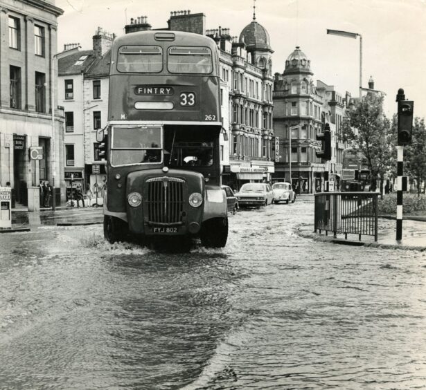 The 33 bus service at the Reform Street and High Street junction in Dundee in 1971.