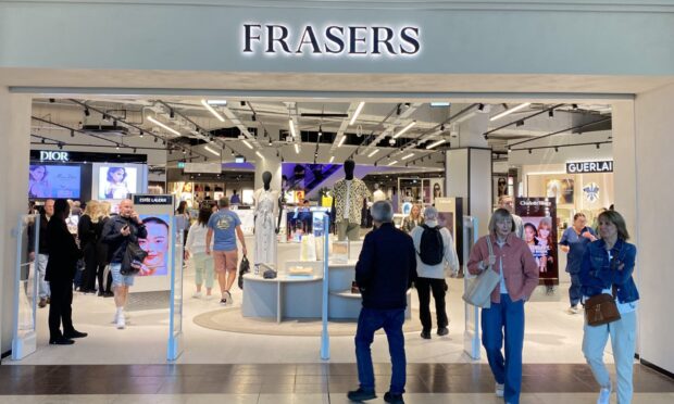 The first shoppers entering Frasers in Dundee. Image: Dylan Lockhart/DC Thomson