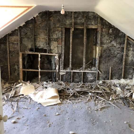 one of the upstairs bedrooms during the renovation