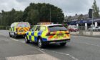 Police vehicles on Hospital Hill on Monday morning.