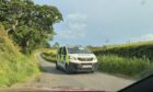 Police van at the scene.