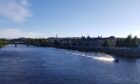 Person on jet ski going through River Tay in Perth
