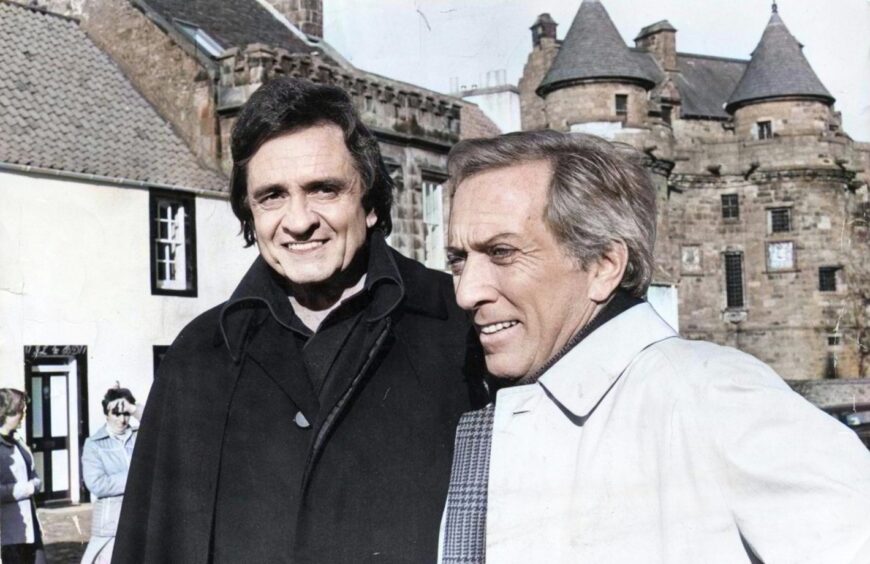 The Man In Black and Andy Williams outside in Falkland. 