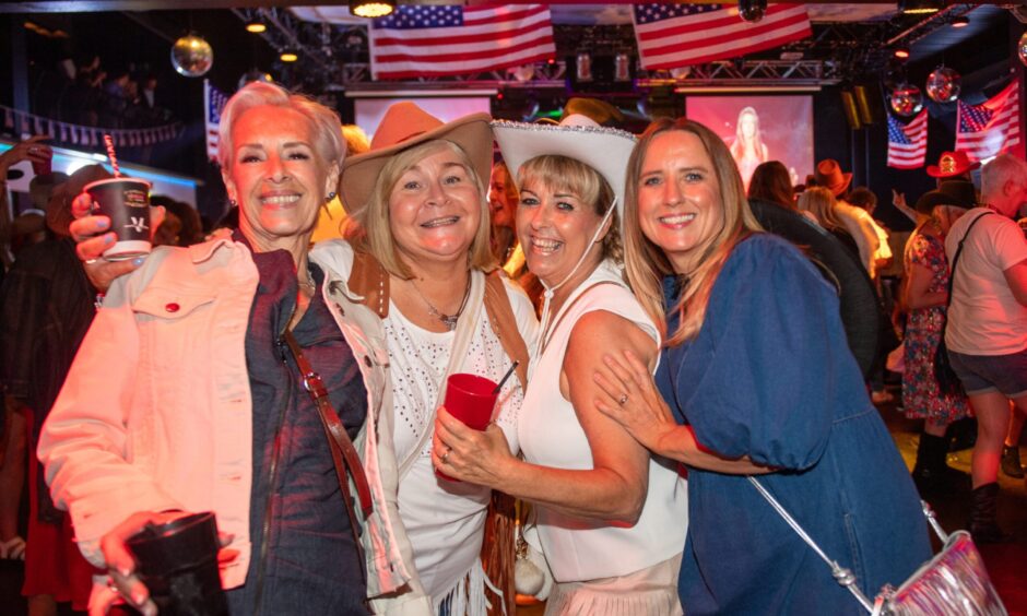 Women at the country party at Aura, Dundee. 