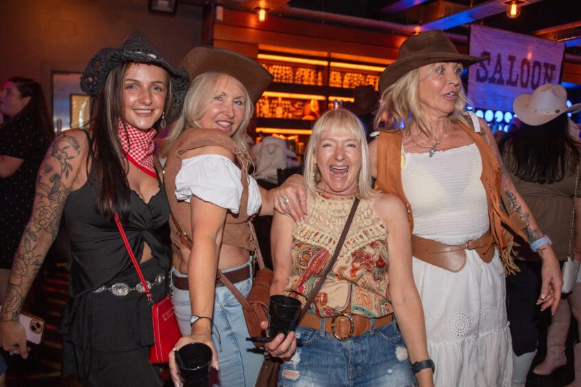 Female revellers at the country party at Aura, Dundee.