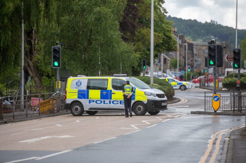 Police closed the road following the fire. 