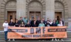 The Dundee Music Festival line-up stand outside the Caird Hall