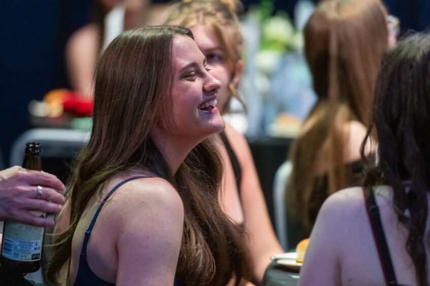 A young woman smiles at Montrose Academy leavers' formal 2025