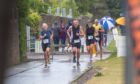 A push for the line at the end of the 10th Montrose triathlon. Image: Kim Cessford/DC Thomson
