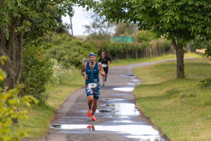 Competitors in the 10th anniversary Montrose triathlon.