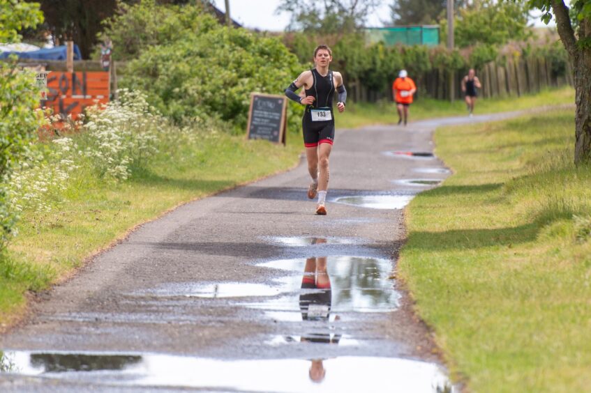 Competitors in the 10th anniversary Montrose triathlon.
