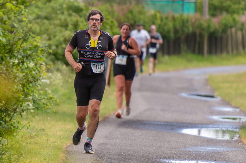 Competitors in the 10th anniversary Montrose triathlon.
