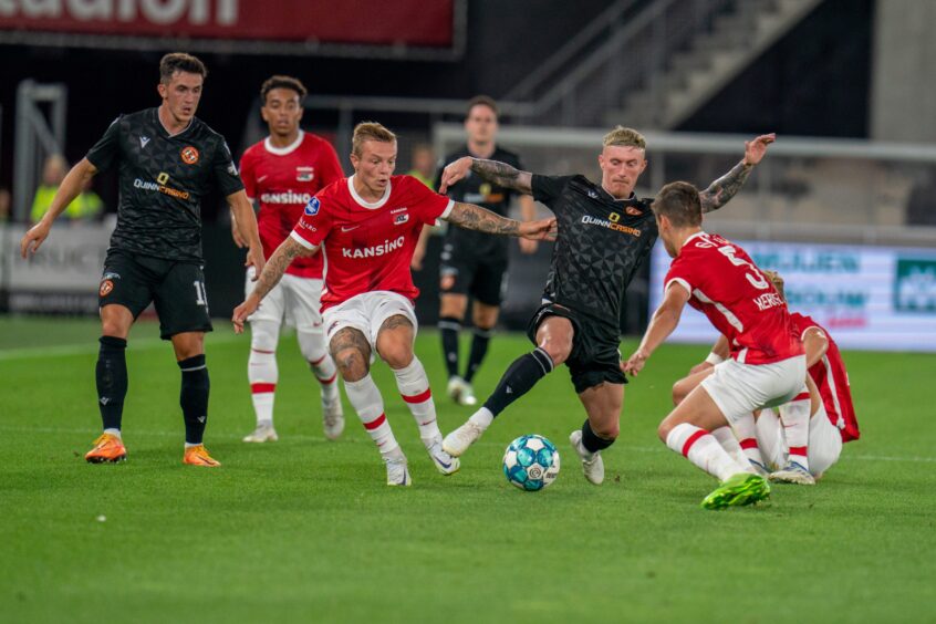 Craig Sibbald attempts to get stuck in, to little avail, in Alkmaar
