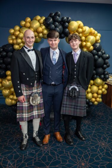 Dan Russo, Tyler Smith and Ben Charlton at the Morgan Academy prom 2025.