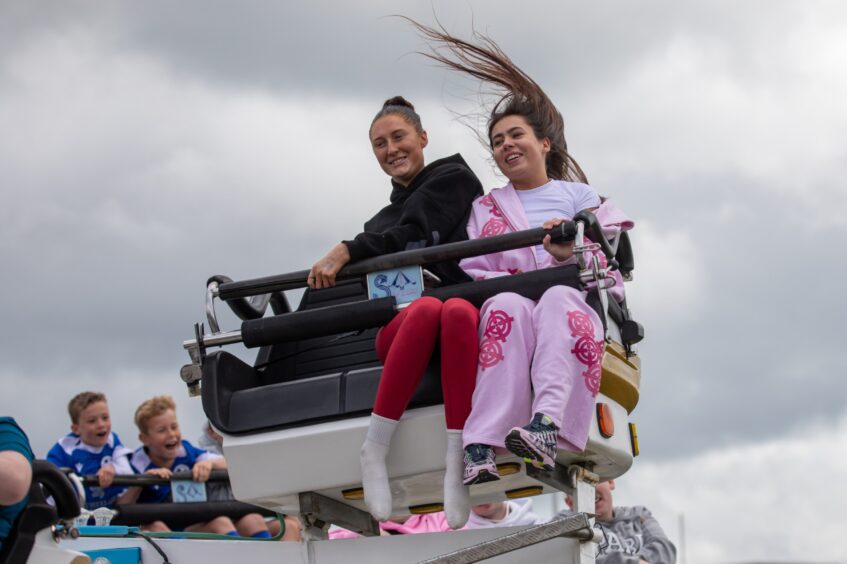 Two girls on a funfair ride
