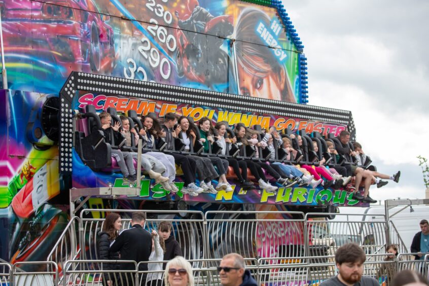People on a funfair ride