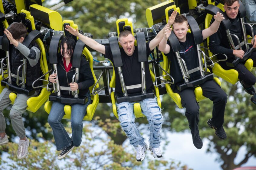 People on a funfair ride