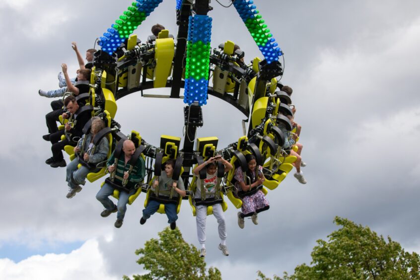 People on a funfair ride