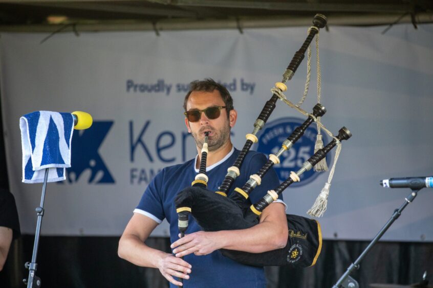 Craig Weir of Gleadhraich plays the bagpipes.