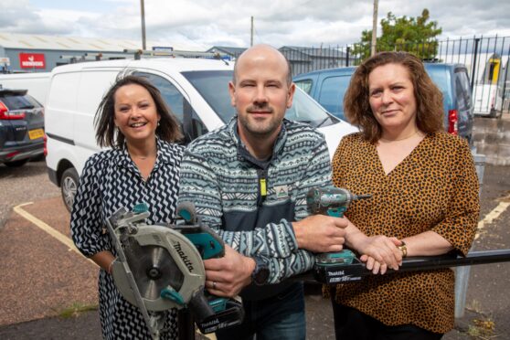 Helen Carlin, small repairs officer Marc Duncan and Kathryn Old at the Forfar office of Angus Small Repairs. Image: Kenny Smith/DC Thomson