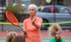 Judy Murray on a tennis court.