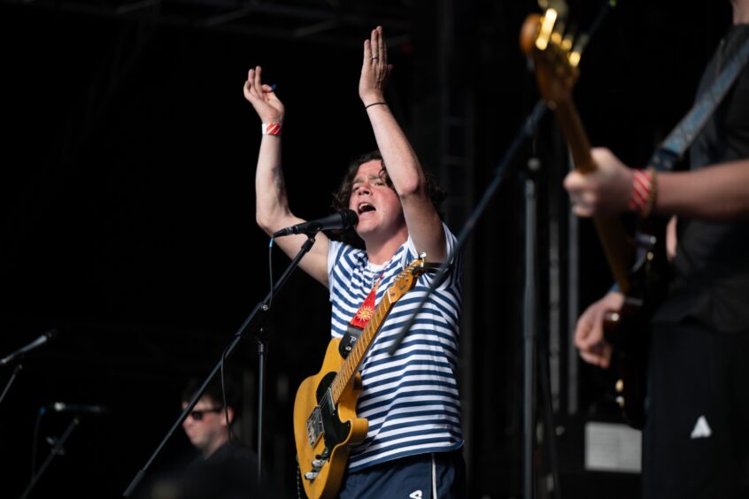 Kyle Falconer performs.