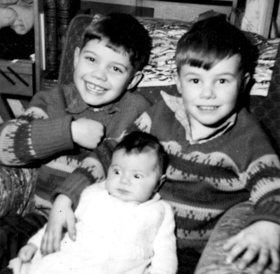 Les Ball as a child with his siblings.