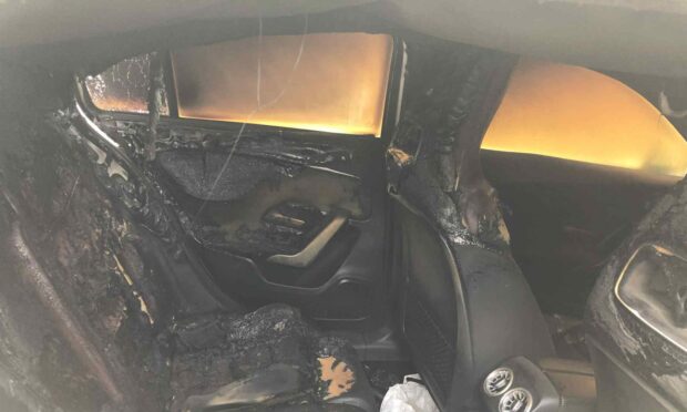 Inside a wrecked vehicle on Longfield Drive, Whitfield, Dundee.