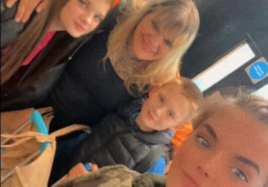 Louise Beattie with children Emily Mather, Euan Shaw and Eliana Shaw.