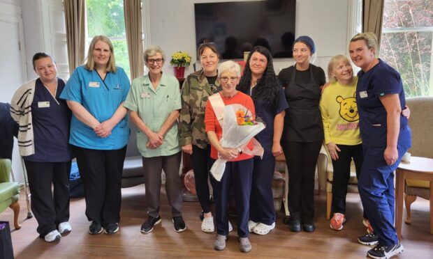 Lynn Cavanagh with colleagues and residents at Brookfield Care Home.