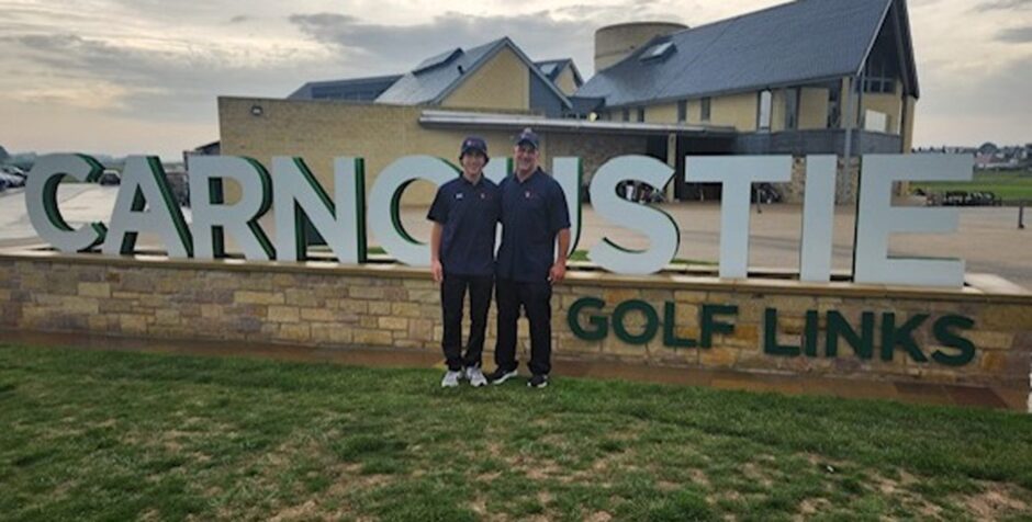 Matthew DiCarlo and dad Richard posing at Carnoustie golf links. 