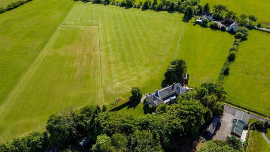 An aerial view of the stunning home and 15 acres of surrounding land in Kinross-shire.